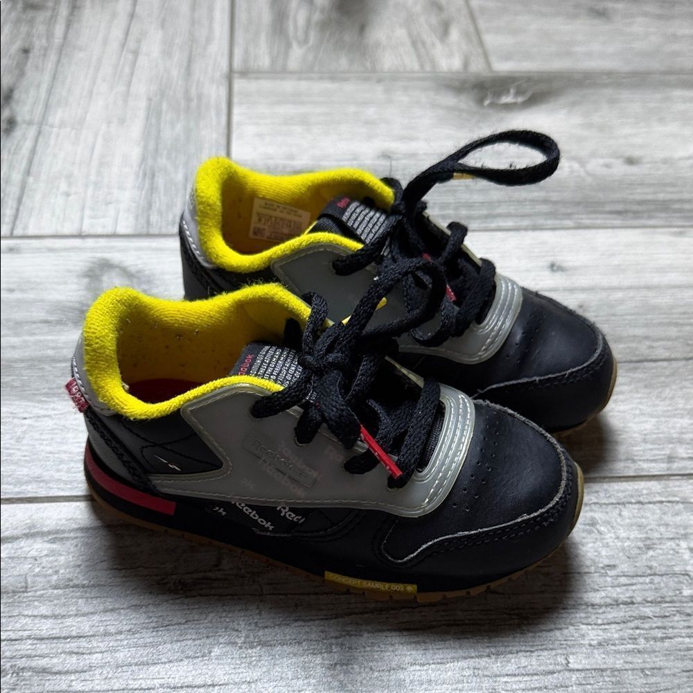 Reebok Toddler Sneakers in Black and Yellow